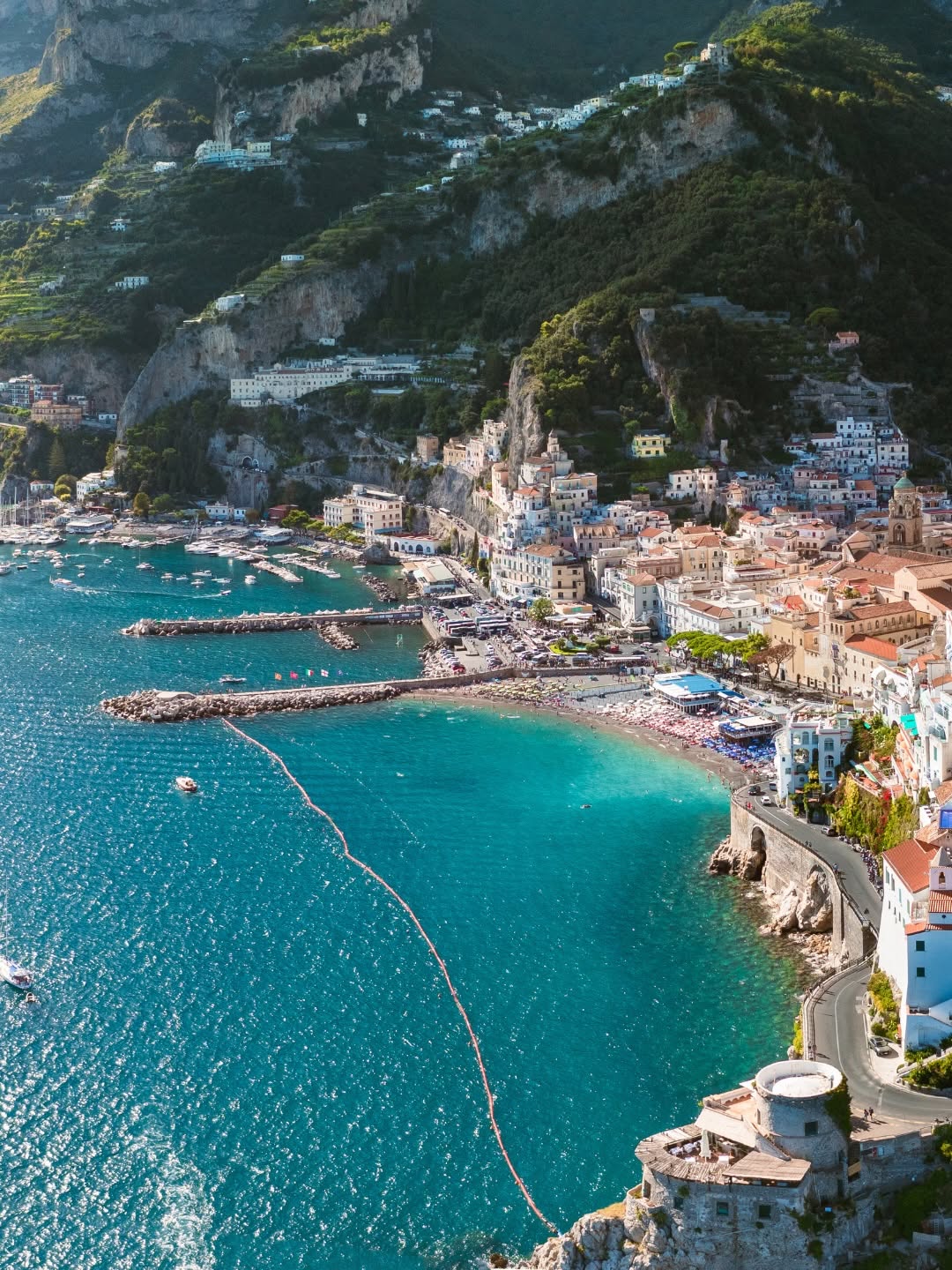 The town of Amalfi beside turquoise water on Italy's Amalfi Coast